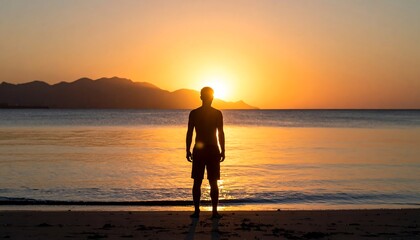 Fototapeta premium Silhouette man beach sunrise
