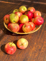 Basket of Apples on Wooden Table