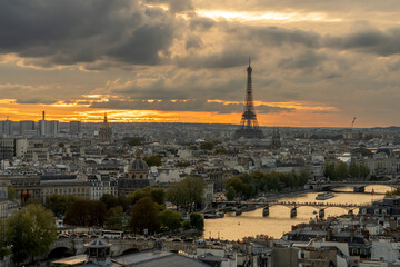 Paris, France - 09 27 2025: Saint-Jacques Tower. Panoramic view of The Seine river, bridges, Eiffel Tower, Les Invalides at sunset