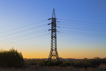 Power transmission tower at sunset