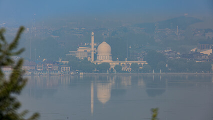 White marble glows by Dal’s gentle waves — serenity at Hazratbal.