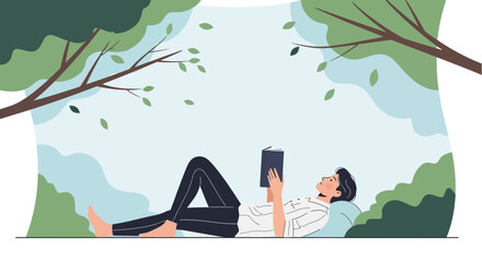 Obraz premium A young man peacefully reading a book while relaxing under the shade of a tree in nature