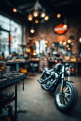 Obraz premium Custom motorcycle showcased in a brightly lit workshop with tools and equipment around during the day