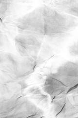 Abstract grunge black and white distressed transparent texture swirly fabric overlay background