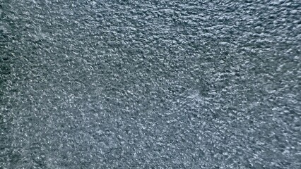 shimmering silver ice crystal texture with frozen ripples and frosted detail for modern wallpaper or abstract commercial background