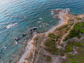 Aerial view of the sunset on the beaches of Rena Majore and Matteu