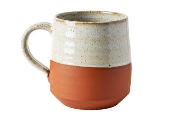 Two-tone ceramic mug isolated on white, rustic pottery drinkware with handle for coffee, tea, or hot beverages