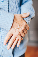 hands of the elderly woman