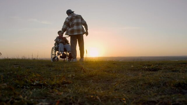 Wide sunset composition features father handing airplane to son, boy lifts arms and releases foam glider joyfully, open field and glowing horizon symbolize freedom and family unity.