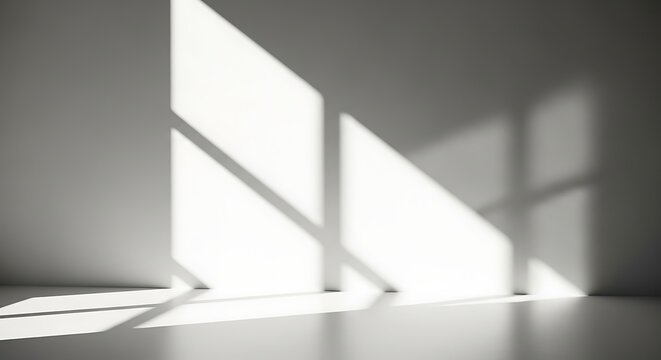 Abstract geometric shadows dance across a sunlit minimalist white room, creating a serene and modern empty interior space with captivating light and shade patterns and a clean, contemporary aesthetic