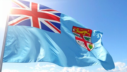 Vibrant Fiji flag proudly waving against a clear blue sky with bright sunbeams, symbolizing national pride and island paradise