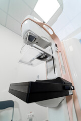 Close up of mammography diagnostic device. Modern breast cancer screening equipment with imaging technology in clinic interior.