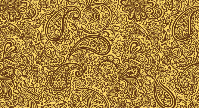Detailed paisley pattern in brown on gold background