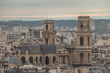 Fototapeta premium Paris, France - 09 27 2025: Detail view of Saint-Sulpice church at sunset