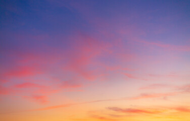 Dramatic purple and orange clouds fill the sky during either sunrise or sunset.