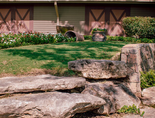 flowers in a garden coming out of a pot