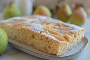 Pear pie on a white plate 