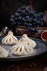 Khinkali – Traditional Georgian Dumplings. Traditional Georgian Bread. Traditional Georgian cuisine styled with authentic atmosphere.