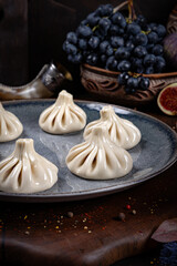 Khinkali – Traditional Georgian Dumplings. Traditional Georgian Bread. Traditional Georgian cuisine styled with authentic atmosphere.