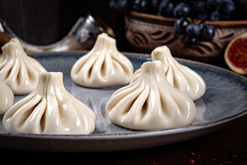 Khinkali – Traditional Georgian Dumplings. Traditional Georgian Bread. Traditional Georgian cuisine styled with authentic atmosphere.