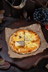 Meat Khachapuri – Georgian Bread with Savory Filling. Traditional Georgian Bread. Traditional Georgian cuisine styled with authentic atmosphere.
