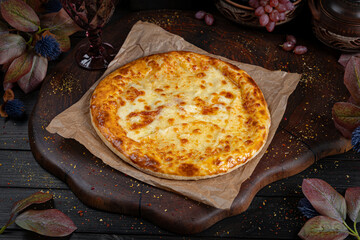 Cheese Khachapuri – Classic Georgian Bread. Traditional Georgian Bread. Traditional Georgian cuisine styled with authentic atmosphere.