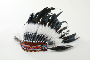 Traditional warbonnet (Native American chief headdress) isolated on white