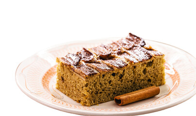 egan banana bread or cake made with organic banana, on isolated white background, copyspace. Traditional homemade cake from Brazil, sold in bakeries