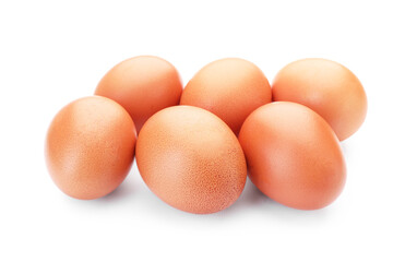 Many raw chicken eggs isolated on white