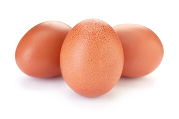 Three raw chicken eggs isolated on white