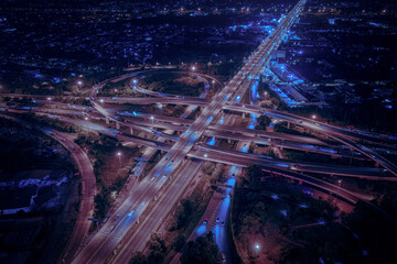 Expressway, Self-driving autonomous electric cars of the future with elements move along a busy traffic intersection. Artificial Intelligence, Car Scan, GPS Tracking, Smart Roads, IoT, highway