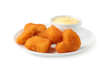 Tasty chicken nuggets with sauce isolated on white