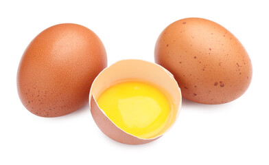 Whole and broken chicken eggs isolated on white