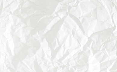 Textured white paper surface showing crinkles folds shadows and highlights for background overlay