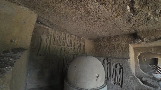 View of the Ancient Rock-Cut Stupa and Buddha Reliefs Inside the Historic Cave No. 2 Vihara in the Kanheri Caves Complex, Mumbai, Maharashtra, India