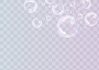 Colorful soap bubbles on a transparent background. Bright, dreamy bubbles with a rainbow gradient effect. Realistic soap bubble element vector set. Vector