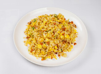 Garlic Fried Rice with Scrambled Egg, Pork, and Herbs in plate top view of japanese food