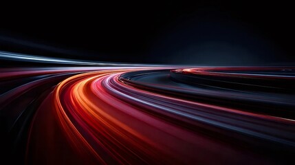 赤い光跡が特徴的な抽象的な道路の夜景