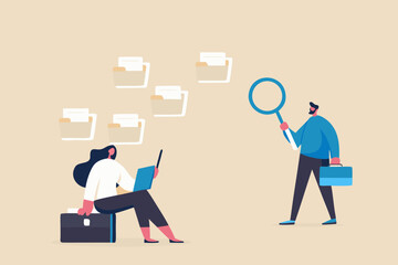 Business people searching and organizing digital files and documents with laptops and magnifying glass