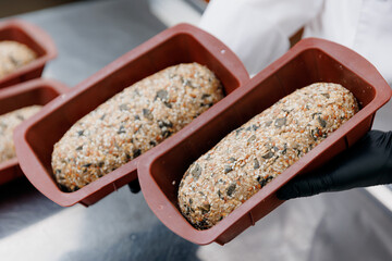 Bakery eco healthy food. Free gluten multigrain bread with seeds, shapes it for baking in oven