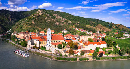 Austria tourism. Wachau valley scenery Danube river boat cruise. scenic village Durnstein ,aerial panoramic view of colorful town and ruined castle