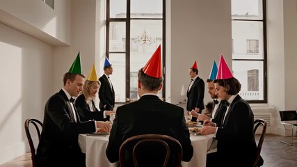 A group of people having a formal dinner, but they're all wearing party hats. Formal meets funny, social humor, unexpected twist.