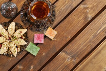 Traditional plate with sweet date fruits and tea