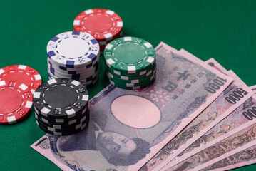 Casino game in the Japan, yen money, chips, cards. Gambling in casinos in the Japan