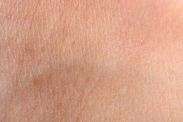 Fototapeta premium Macro view of human skin with wrinkles as background