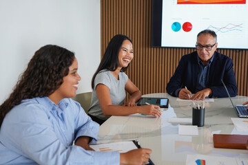 Multiracial business people working together inside modern office sharing ideas - Multi generational colleagues and entrepreneur concept