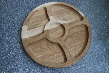 Wooden dishes on the table. Wooden tableware. Wooden dishes for various dishes.