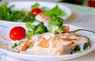 Healthy Meal of Salmon and Broccoli, with a Focus on the Cherry Tomato