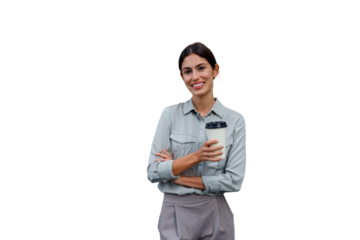 Confident businesswoman smiling, holding coffee, looking at camera with arms crossed, transparent background