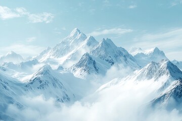 Fototapeta premium Majestic snow-capped mountains rise above clouds on a clear day in a winter landscape